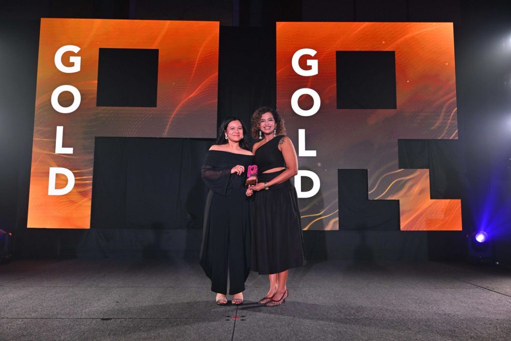 Vox Group team holding A+M PR Awards Singapore 2025 trophies